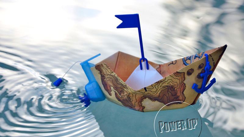 Illustration for article titled Power Your Origami Paper Boat With This Tiny Outboard Motor